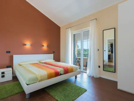 Villa avec piscine chauffée et vue mer à Pomer : photo 15