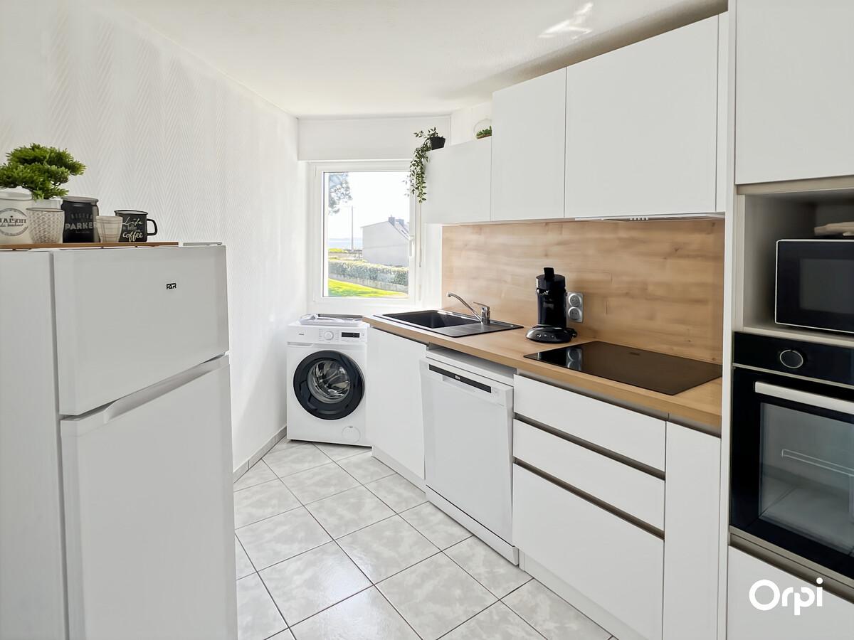 T2 vue mer avec balcon, garage et cave à Ploemeur - Photo 11