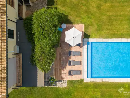 Location villa à Sa Pobla, Villa spacieuse à Sa Pobla avec piscine et climatisation pour des vacances relaxantes