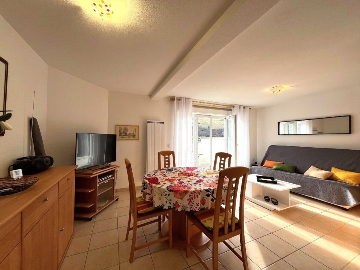 T2 52m² La Bourboule, terrasse sud, garage vélos - Photo 2