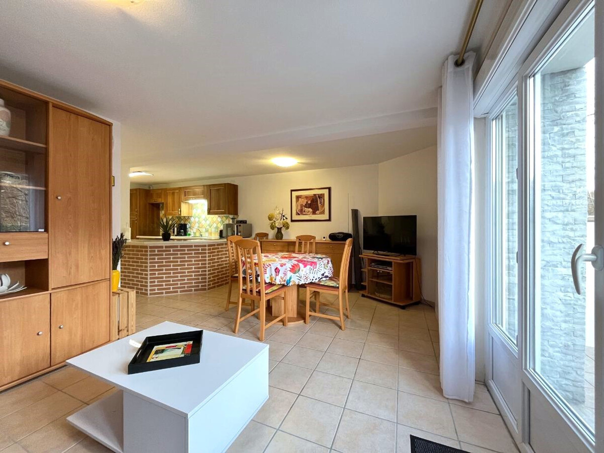 T2 52m² La Bourboule, terrasse sud, garage vélos - Photo 3