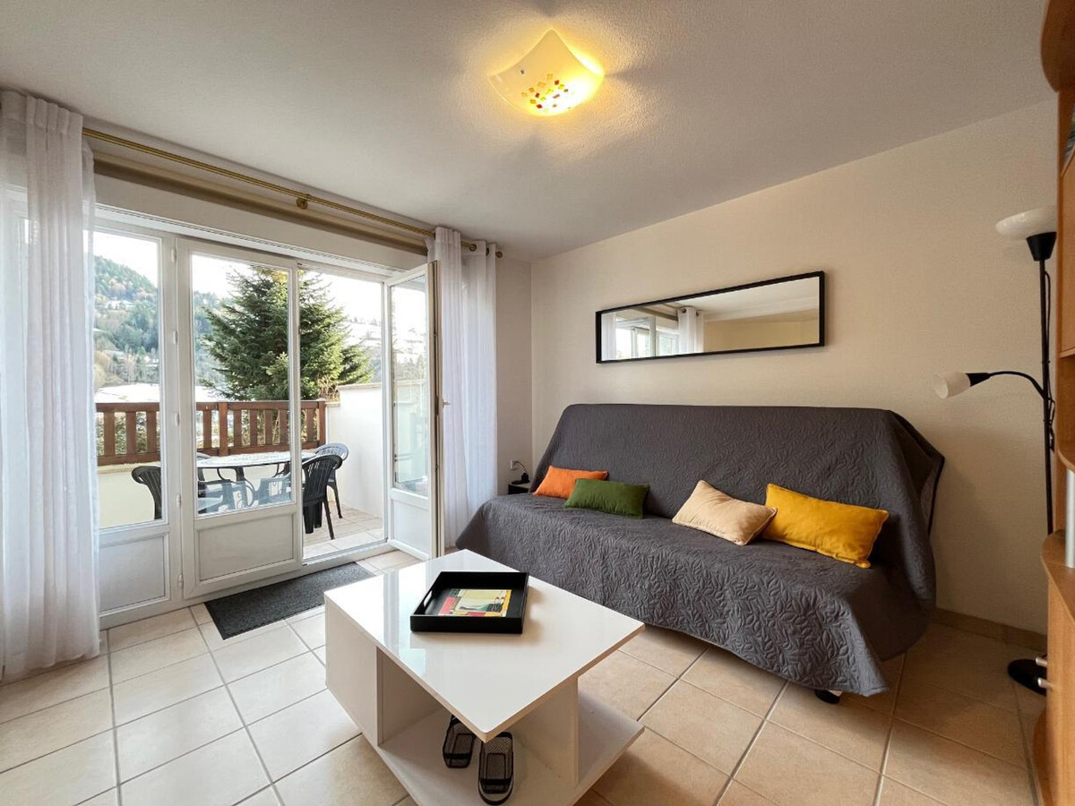 T2 52m² La Bourboule, terrasse sud, garage vélos - Photo 4