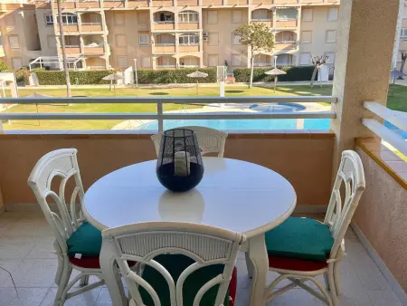 Location appartement à Denia, Appartement bord de mer avec piscine et parking à Denia, pour 6 personnes