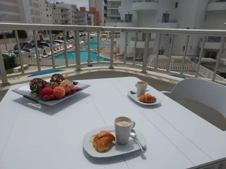 Location appartement à Gandía, Appartement confortable avec piscine, parking et climatisation à Gandía, Espagne