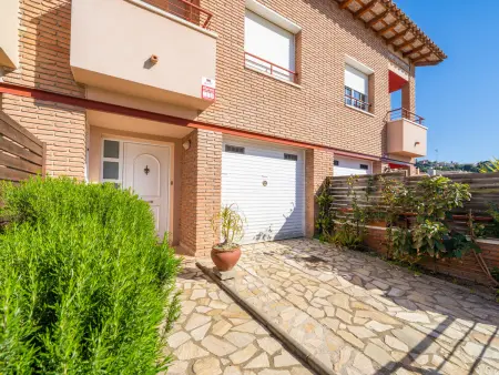 Location gite à Santa Susanna, Maison de ville avec jardin, WiFi et parking près de la plage à Santa Susanna