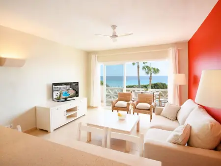 Location appartement à Es Migjorn Gran, Moderne Ferienwohnung mit traumhaftem Meerblick