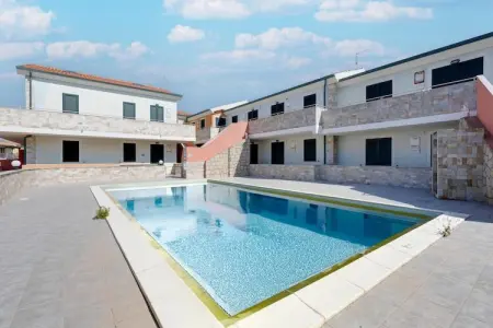 Location appartement à Valledoria, Piscine, climatisation, parking