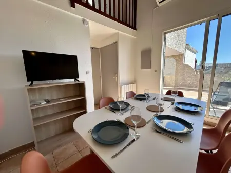 T2 mezzanine climatisé à Cap d'Agde avec piscine : photo 7
