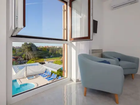 Villa Nicole : 10 personnes, piscine et vue mer à Banjole : photo 3