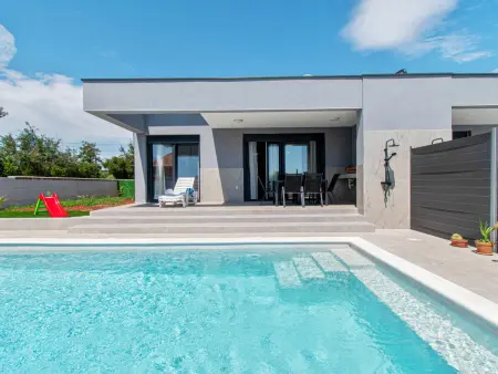 Villa Teo à Pula : maison 75 m² piscine privée : photo 1