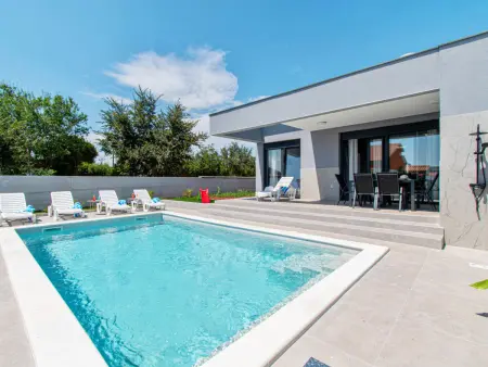 Villa Teo à Pula : maison 75 m² piscine privée : photo 2