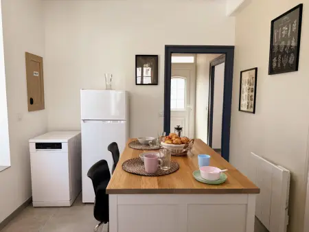 Gîte en plein bourg avec garage et cour aménagée : photo 10