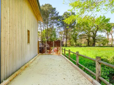 Chalet bois avec jacuzzi et terrain de pétanque à Gastes : photo 4