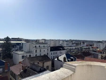 Appartement art déco au 5e étage avec balcon à Vichy : photo 5
