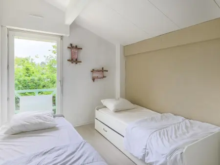 Duplex Biscarrosse : jardin clos, terrasse et parking privé : photo 8