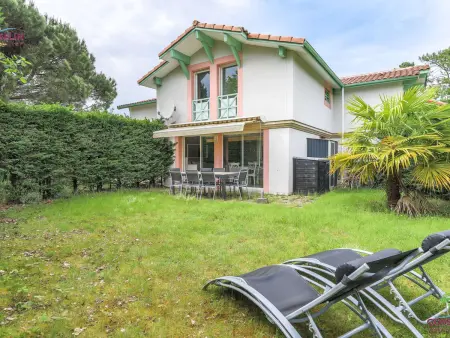 Duplex Biscarrosse : jardin clos, terrasse et parking privé : photo 12