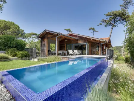 Villa contemporaine vue lac, piscine débordement & spa : photo 4
