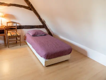 Maison familiale avec grand jardin et cheminée à Coullons : photo 5