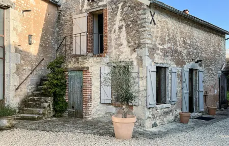 Maison 70 m² en pierre, jardin clôturé à La Boissière : photo 1