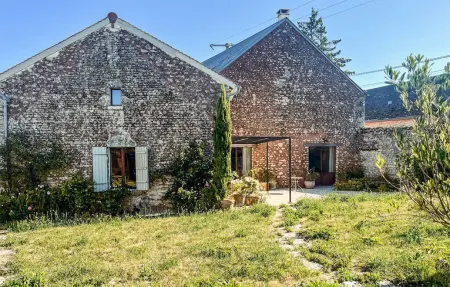 Maison 70 m² en pierre, jardin clôturé à La Boissière : photo 2