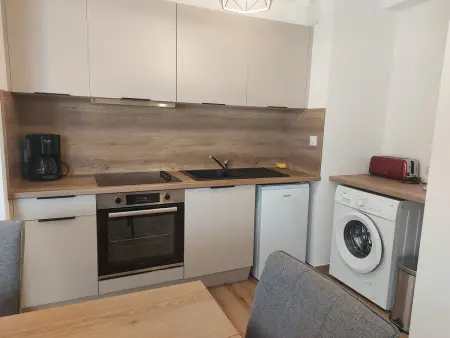Appartement 2 chambres avec terrasse et parking sécurisé : photo 4