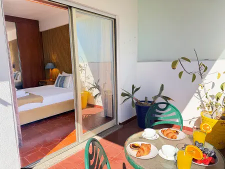 Appartement vue mer à Porches avec piscine et terrasse : photo 22