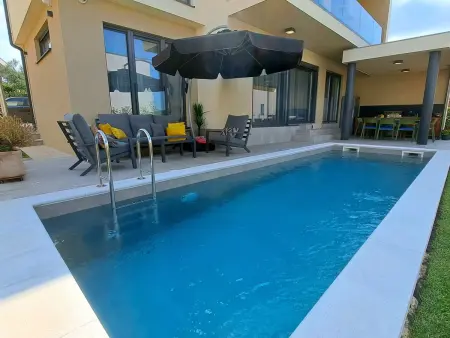 Villa Val à Medulin : 4 chambres, piscine privée et vue mer : photo 8