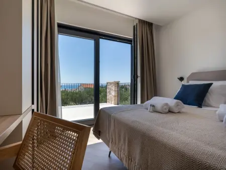 Villa Orkula à Rab : piscine chauffée et vue mer : photo 27