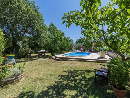 Maison Nina à Pula : piscine et terrasse couverte : photo 23