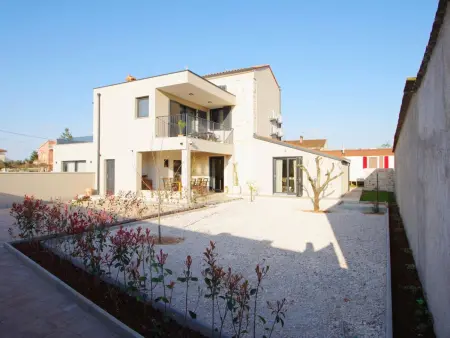 Poli Nona, maison mitoyenne rénovée à Valbandon : photo 50