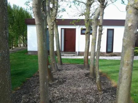 Ein Bungalow in einem Ferienpark, ganz in der Nähe vom Meer - Photo 29