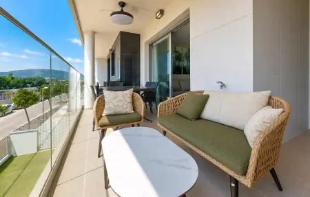 Appartement Sol y Mar à Torre La Sal : terrasse couverte et piscine : photo 8