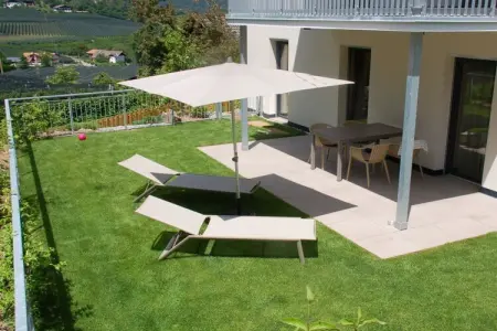 Maison Viola à Völlan : 6 personnes, jardin clos : photo 4