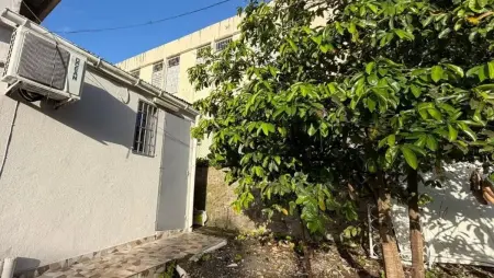 Appartement avec jardin clos et parking privé aux Abymes : photo 1