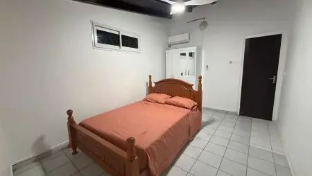 Appartement avec jardin clos et parking privé aux Abymes : photo 6