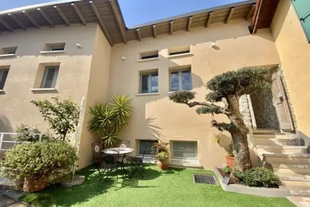 Maison de vacances avec jardin privé, vue lac à Limone