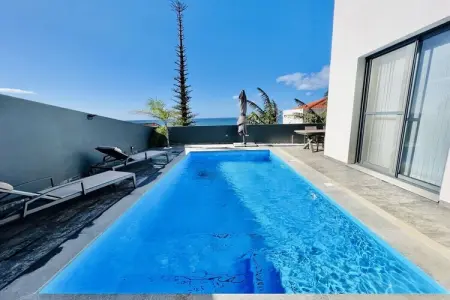 Maison 4 pers. avec piscine chauffée et vue mer à Paul do Mar : photo 5