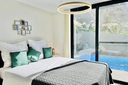 Maison 4 pers. avec piscine chauffée et vue mer à Paul do Mar : photo 12