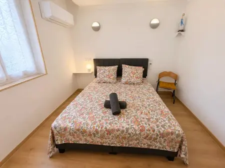Appartement 90 m² à Lourdes avec jardin clos et parking inclus : photo 5