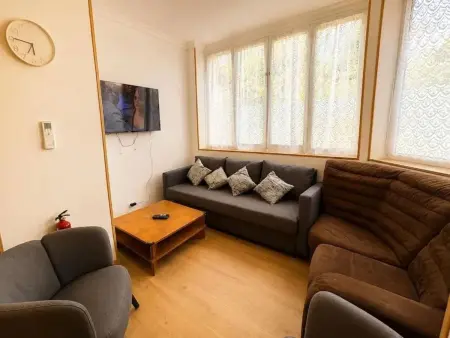 Appartement 90 m² à Lourdes avec jardin clos et parking inclus : photo 8