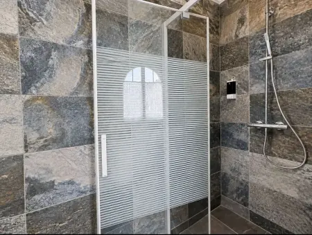 Appartement 90 m² à Lourdes avec jardin clos et parking inclus : photo 10