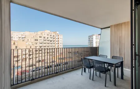Appartement vue mer, terrasse couverte et piscine à Ostende : photo 1