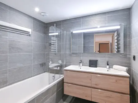 Appartement Phoenix B02 – Terrasse 27 m², accès ski pieds : photo 12