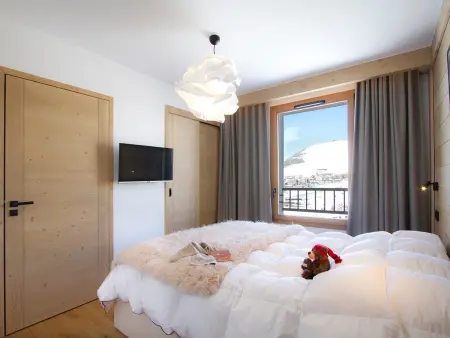 Appartement dernier étage, balcon Sud-Ouest, vue pistes à Huez : photo 6