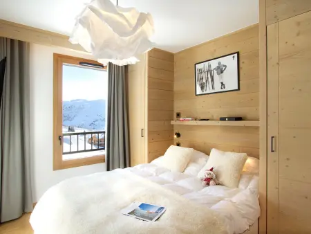 Appartement dernier étage, balcon Sud-Ouest, vue pistes à Huez : photo 8