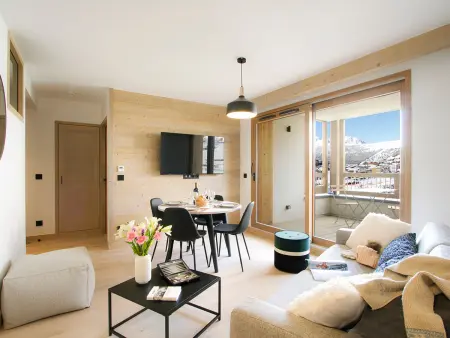 Appartement ski aux pieds à Huez avec piscine : photo 1