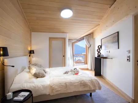 Appartement 4 chambres dernier étage, balcon 27m² - Huez : photo 7