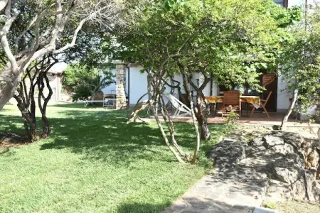 Maison 3 pièces avec jardin et terrasse couverte : photo 6