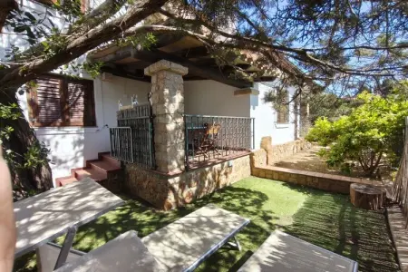 Maison 3 pièces avec jardin et terrasse couverte : photo 7