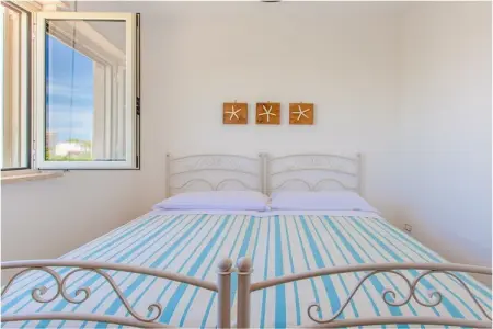 Villa Orchidea à Torre Santa Sabina, 400 m de la plage : photo 19